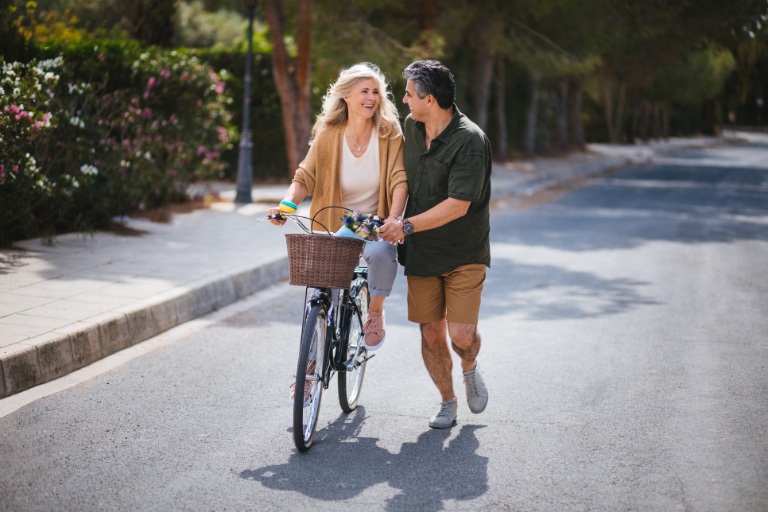 couple having fun with bike